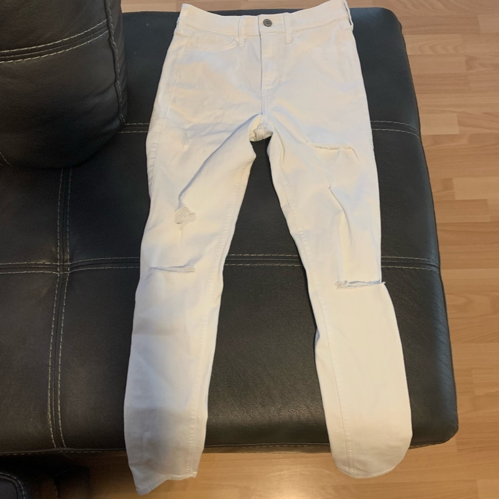 white jeans with rips